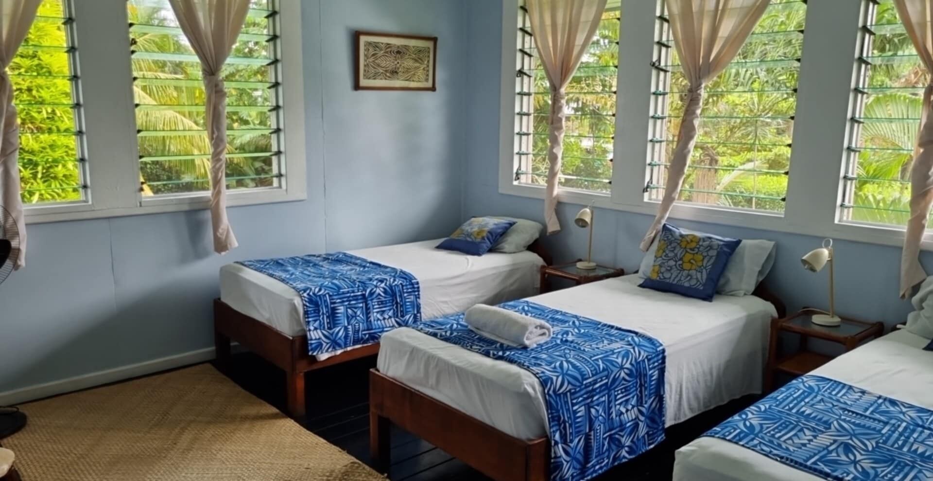 standard room with shared facilities | in-room safe, individually decorated, individually furnished