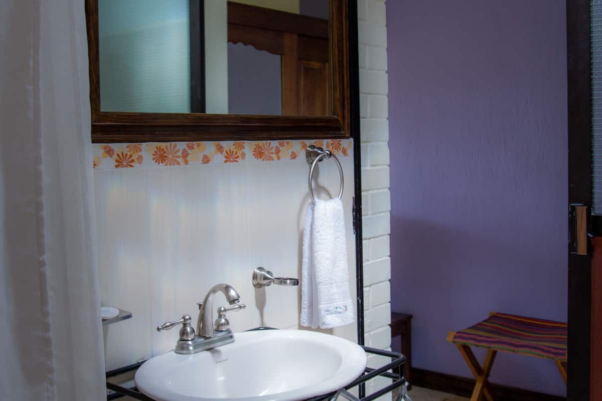 family double room, multiple beds | individually decorated, individually furnished, blackout curtains