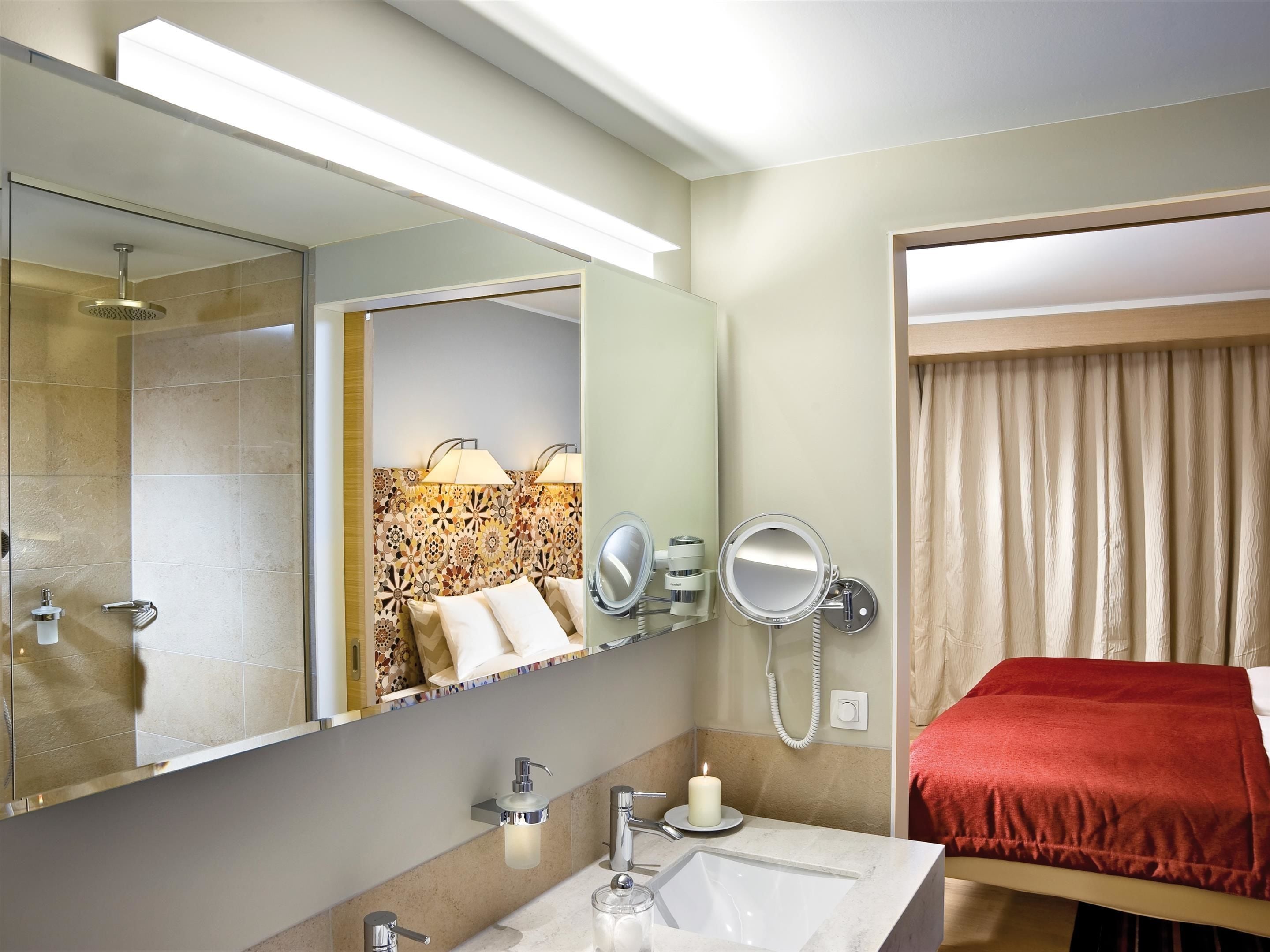 rainfall showerhead, designer toiletries, hair dryer, bathrobes