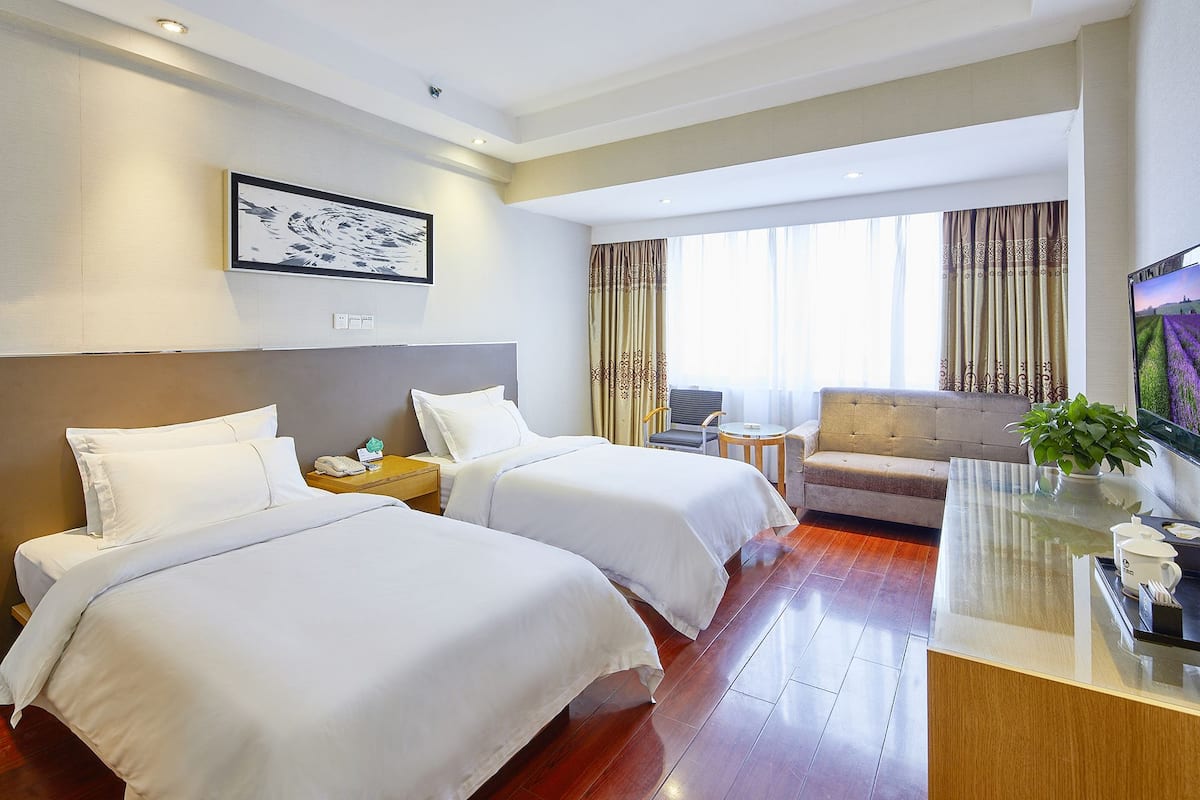 Premium bedding, down duvets, memory-foam beds, in-room safe