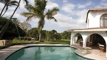 2 outdoor pools, open 6:30 AM to 7 PM, pool umbrellas, pool loungers