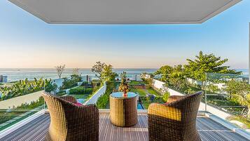 On the beach, surfing