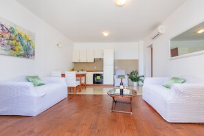 Superior Suite, Terrace, Sea View | Living area | TV, DVD player