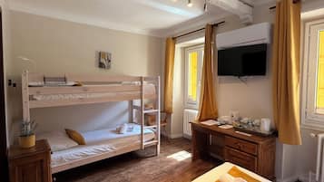 Standard Triple Room | 1 bedroom, Select Comfort beds, individually furnished, blackout drapes