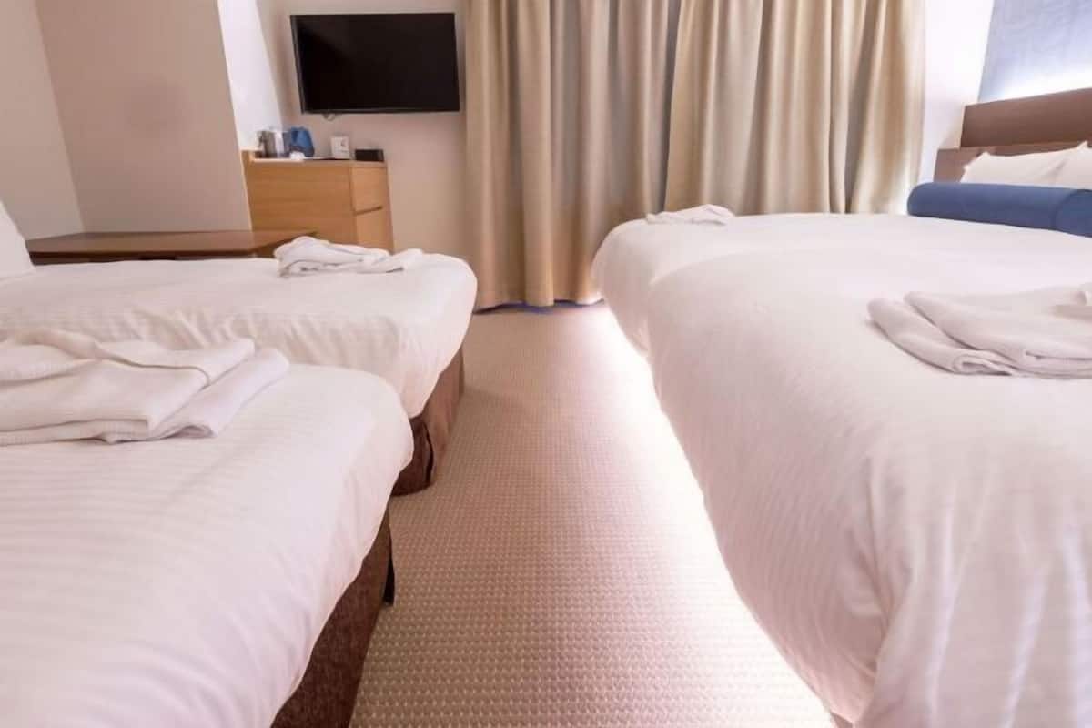 Hypo-allergenic bedding, down duvets, desk, blackout curtains