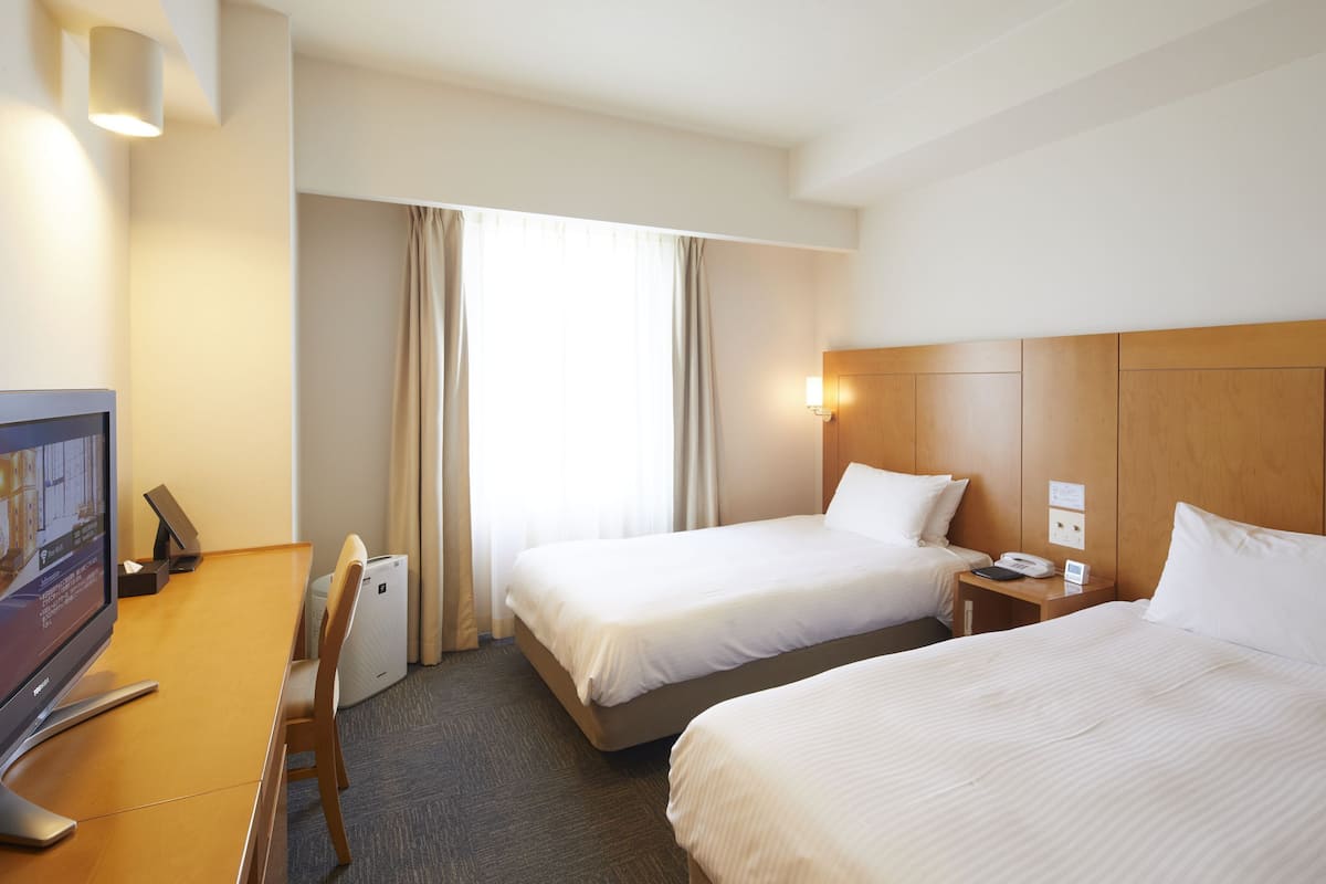 Hypo-allergenic bedding, down duvets, desk, blackout curtains