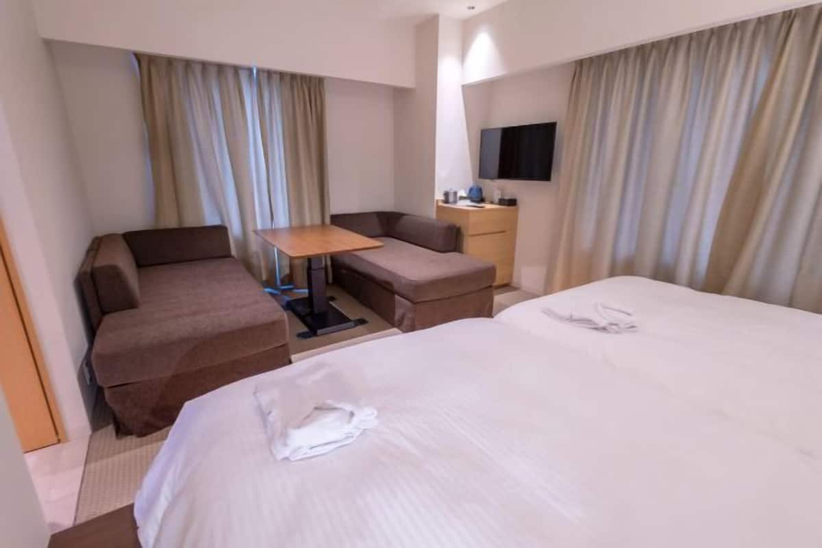 Hypo-allergenic bedding, down duvets, desk, blackout curtains