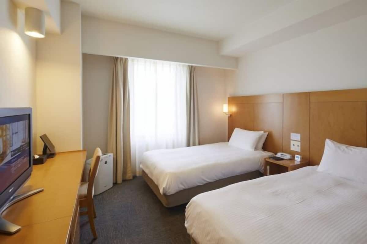 Hypo-allergenic bedding, down duvets, desk, blackout curtains