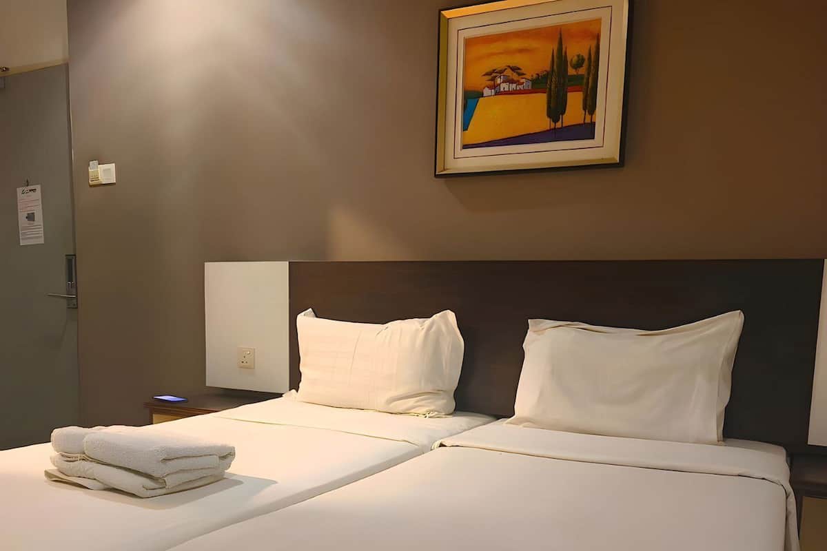 In-room safe, iron/ironing board (on request), bed sheets