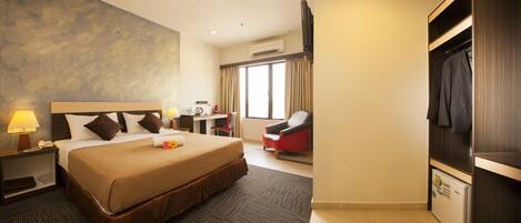 Coffres-forts dans les chambres, fer et planche à repasser