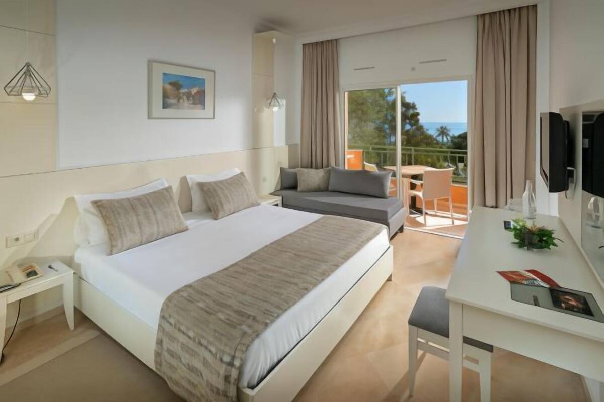 Desk, blackout curtains, free WiFi, bed sheets