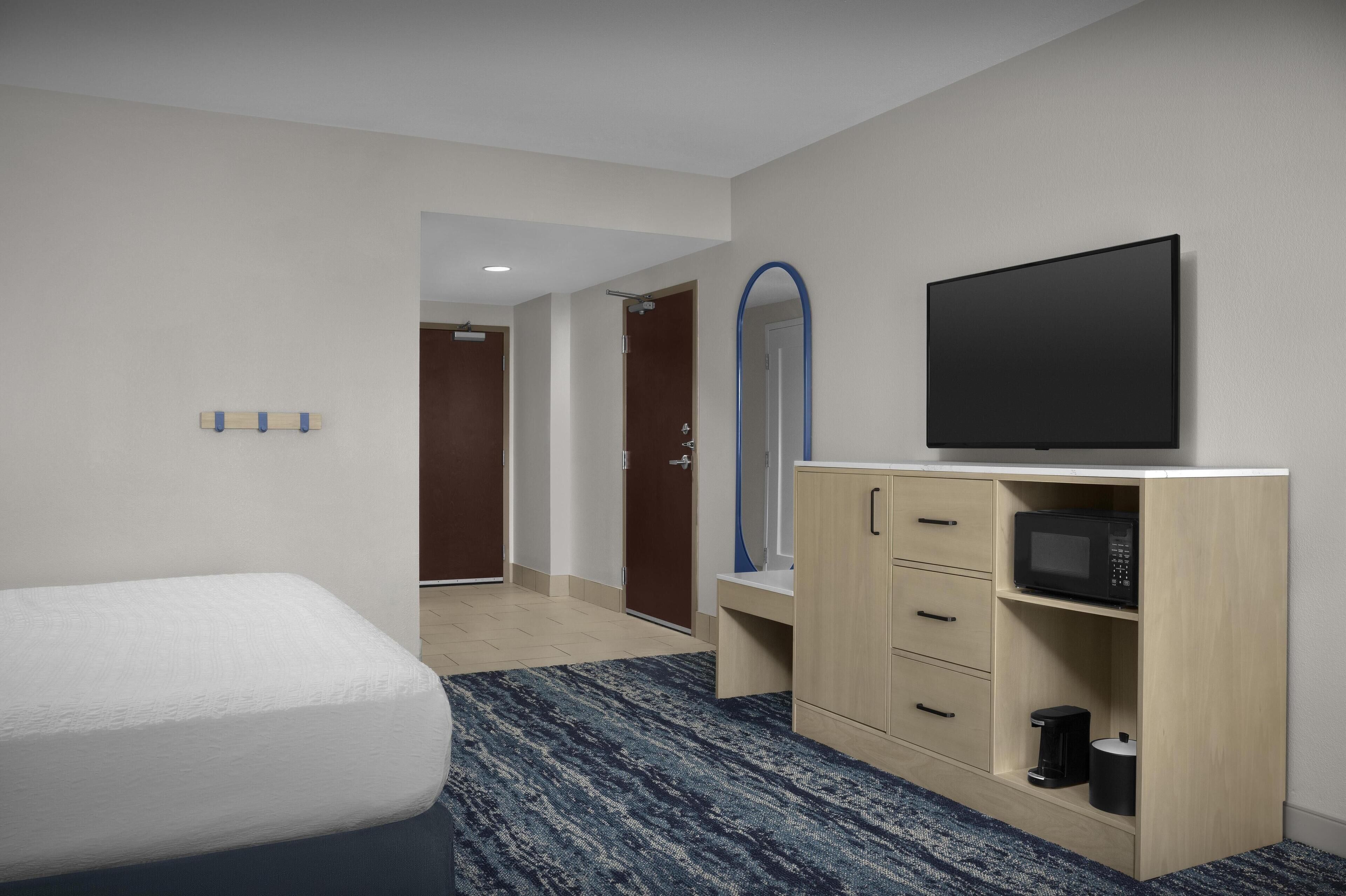 Coffres-forts dans les chambres, fer et planche à repasser