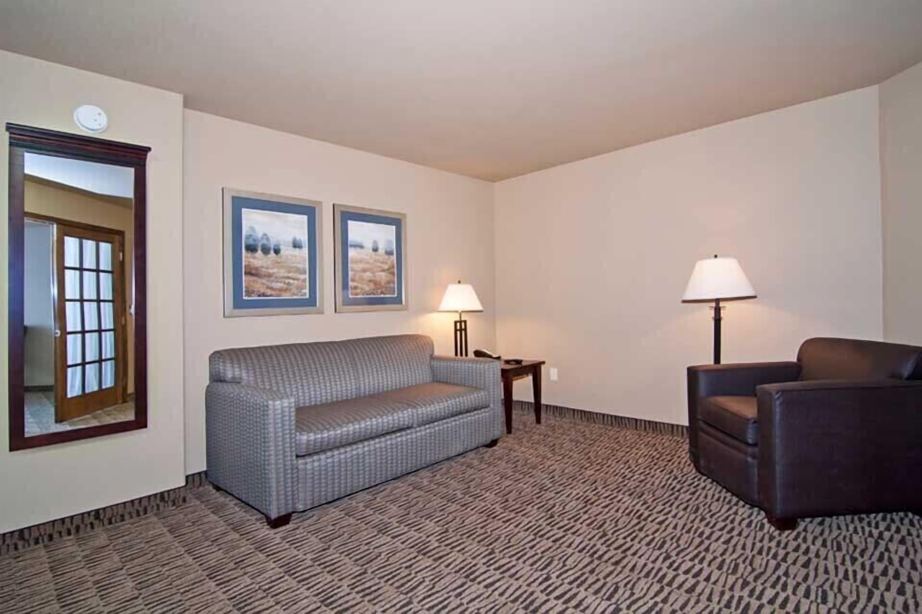 desk, laptop workspace, iron/ironing board, rollaway beds