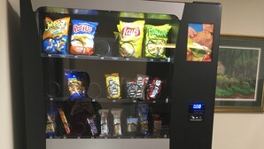 A vending machine with snacks and drinks. - Waterford Inns on the Hudson (Waterford)