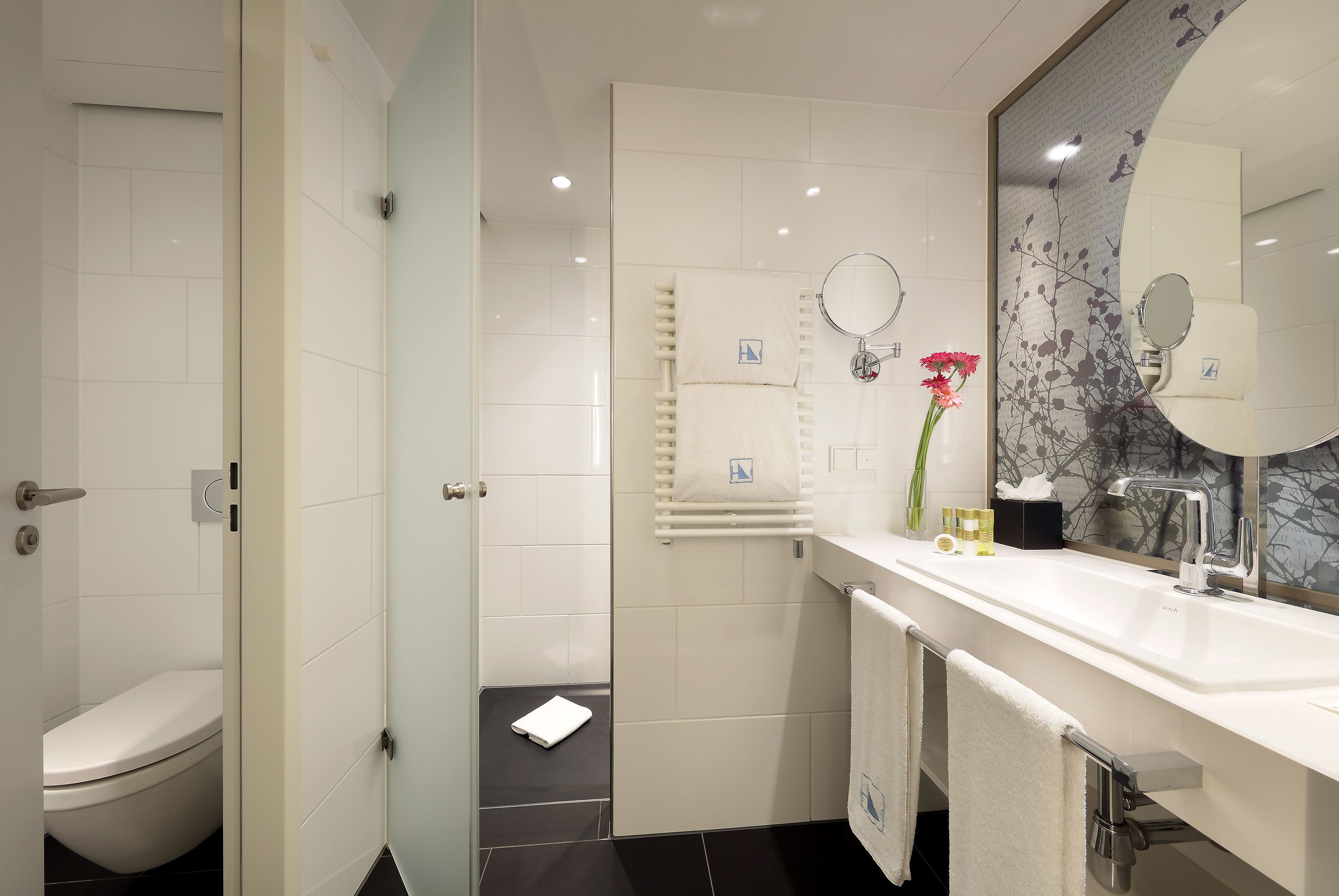 shower, eco-friendly toiletries, hair dryer, towels