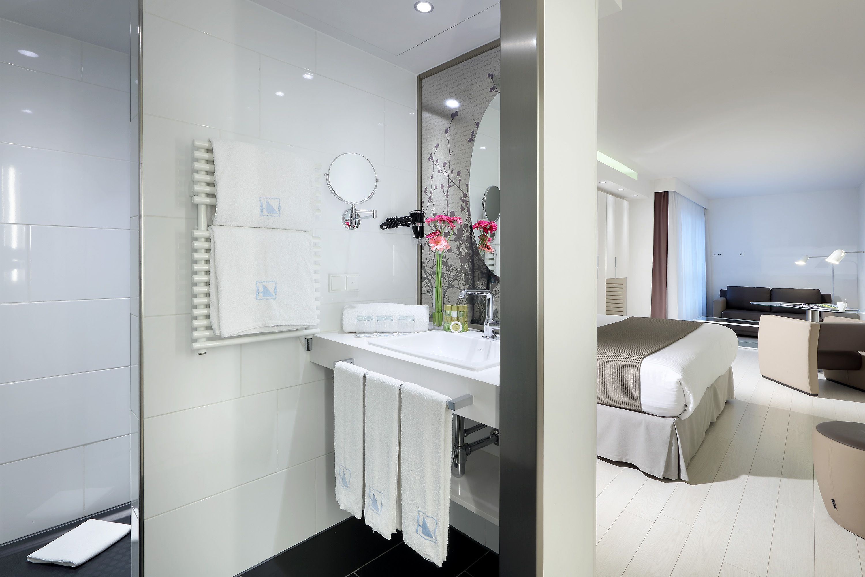 shower, eco-friendly toiletries, hair dryer, towels