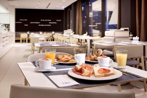 Daily buffet breakfast (EUR 18 per person)
