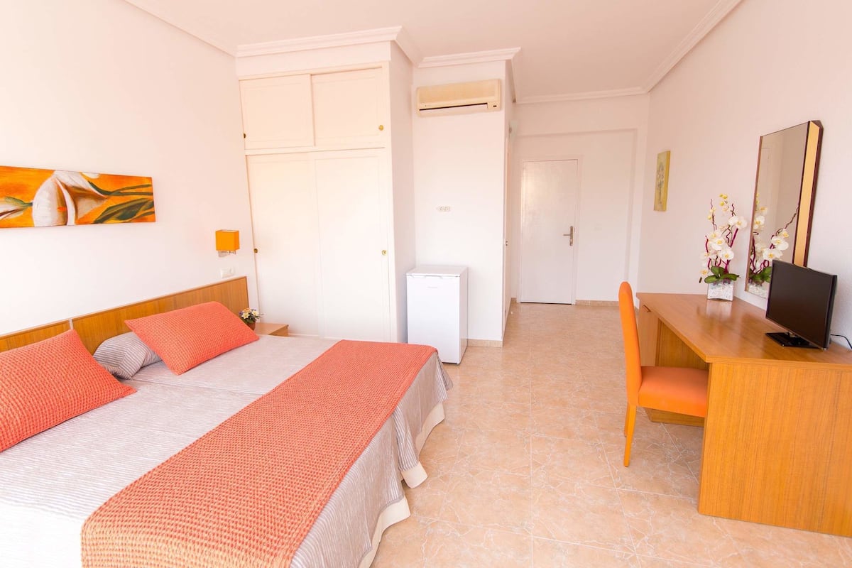 In-room safe, desk, laptop workspace, blackout curtains
