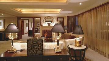 Superior Suite, 1 King Bed | Living area | TV