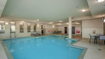 Indoor pool, open 6:00 AM to 10:00 PM, pool loungers