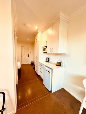 Fridge, microwave, coffee/tea maker, electric kettle