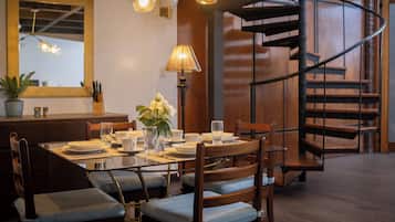 Deluxe Loft, 3 Bedrooms | Living area | 52-inch flat-screen TV with digital channels, streaming services