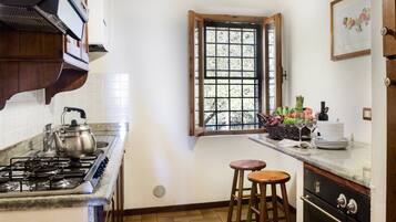 Appartamento, 2 camere da letto (Il Focolare) | Cucina privata | Frigorifero con congelatore, bollitore elettrico, seggiolone, freezer