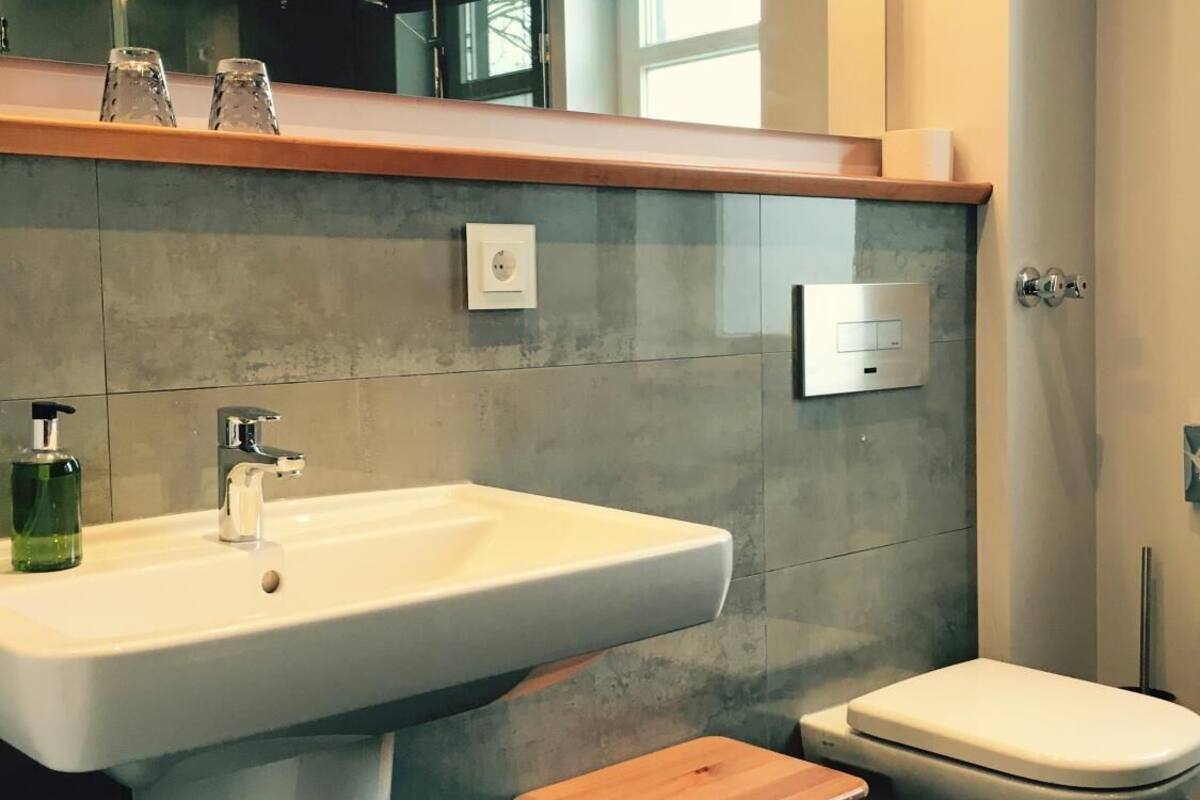 shower, hair dryer, dressing gowns, towels