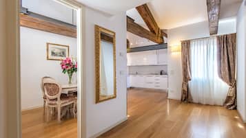 Deluxe Apartment, Canal View (Open Space) | Living room | LCD TV