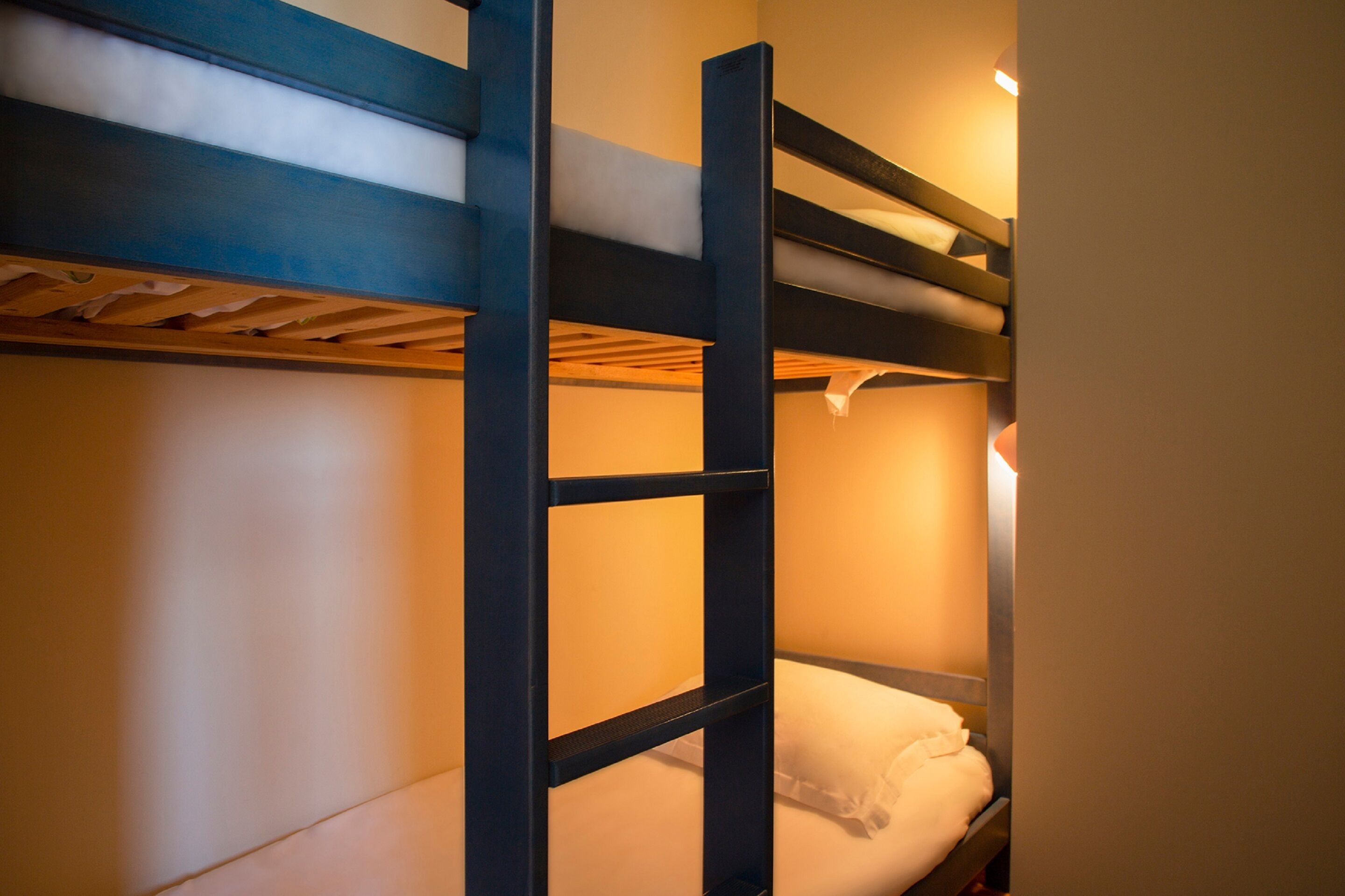 family room | premium bedding, memory-foam beds, desk, laptop workspace