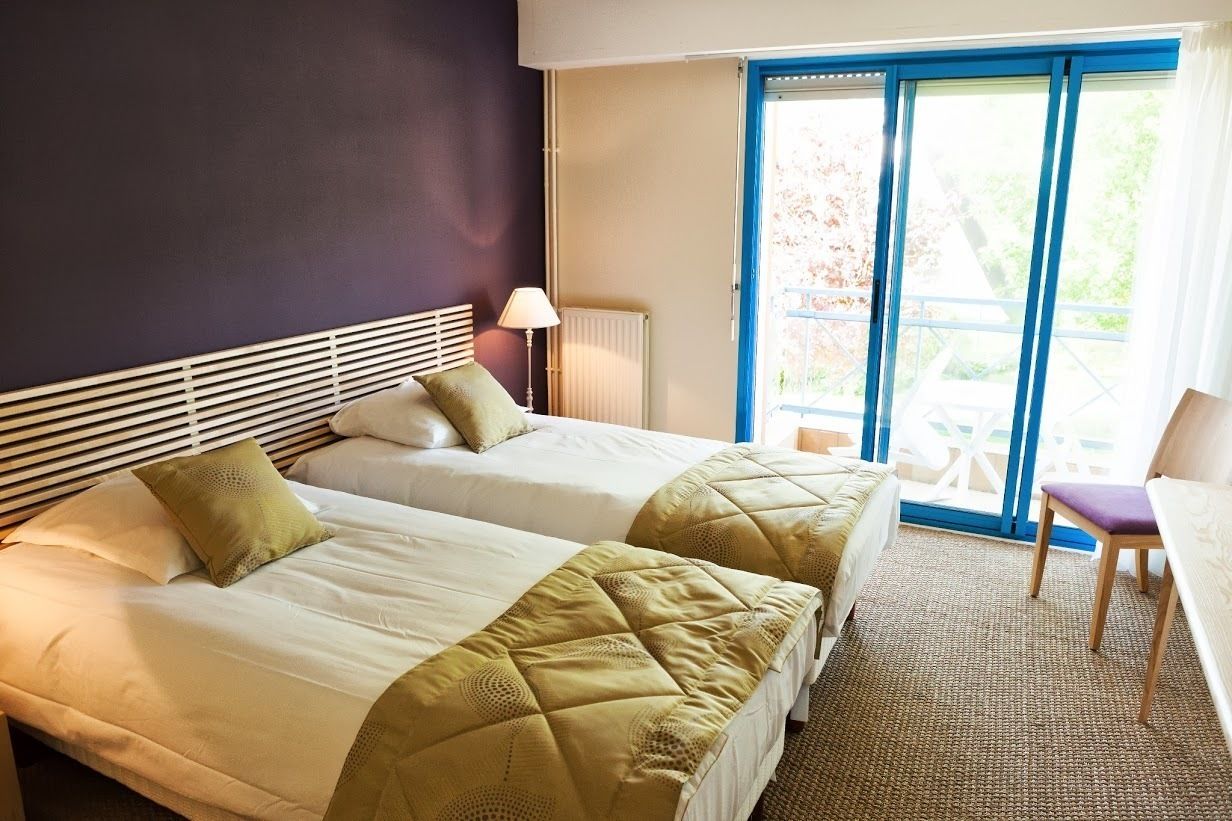 double room | premium bedding, memory-foam beds, desk, laptop workspace