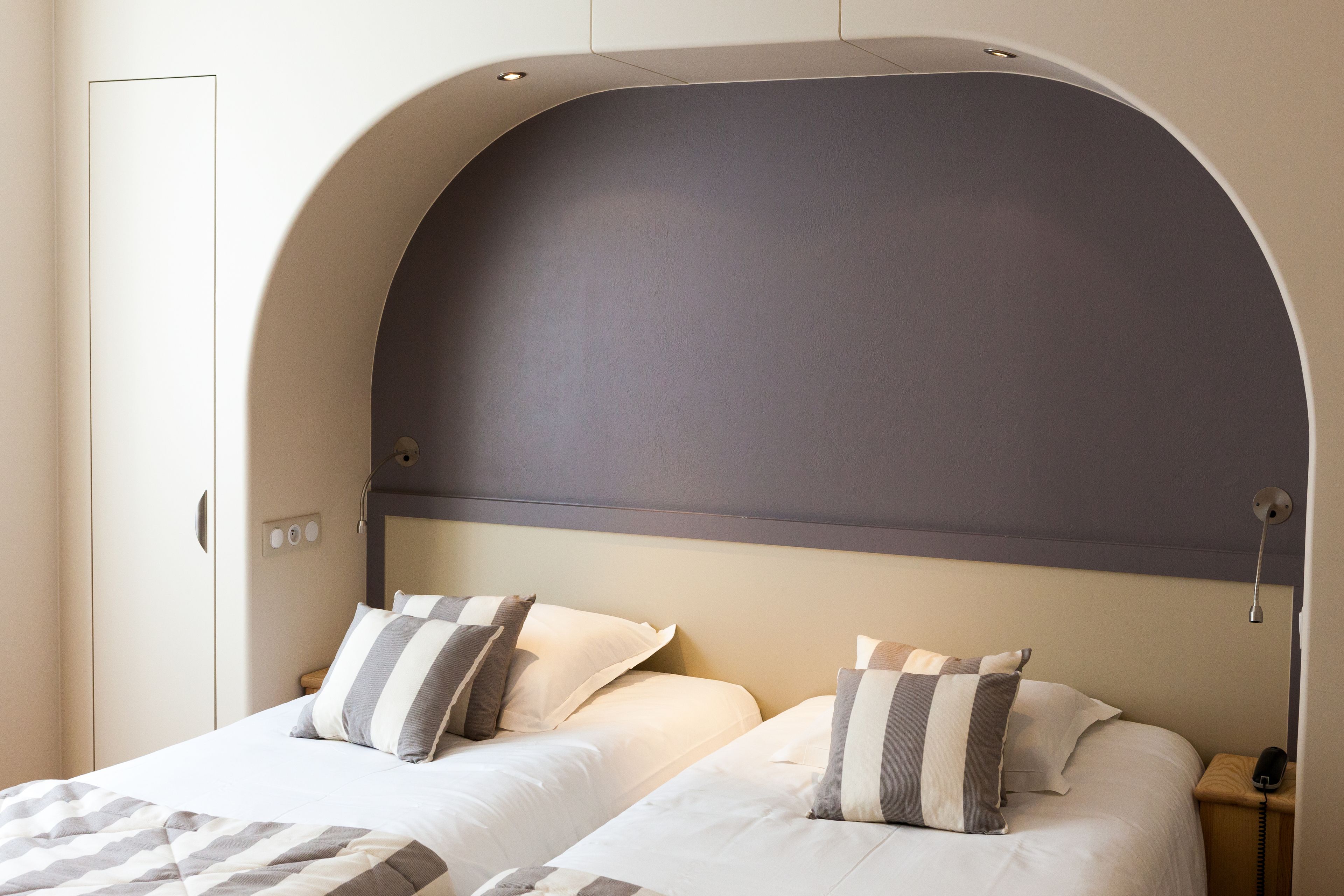 premium bedding, memory-foam beds, desk, laptop workspace