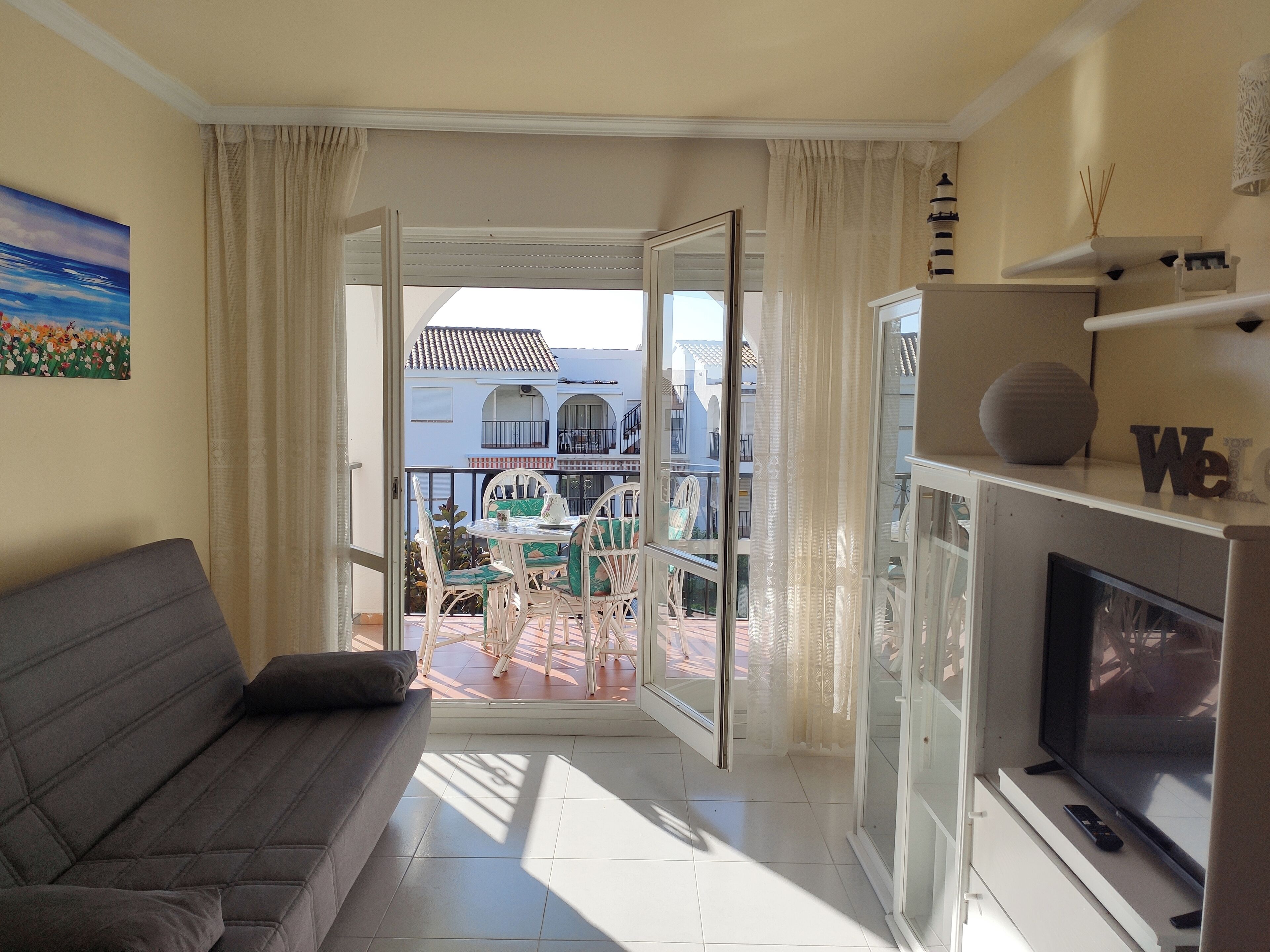 Basic Apartment | Living area | 21-inch TV with digital channels