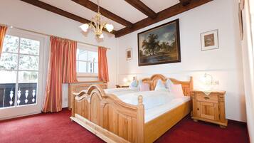 Hypo-allergenic bedding, down duvets, in-room safe