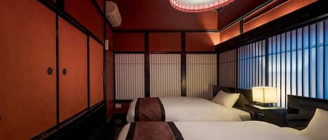 1 غرفة نوم وألحفة محشوة بالريش وخزنة داخل الغرفة