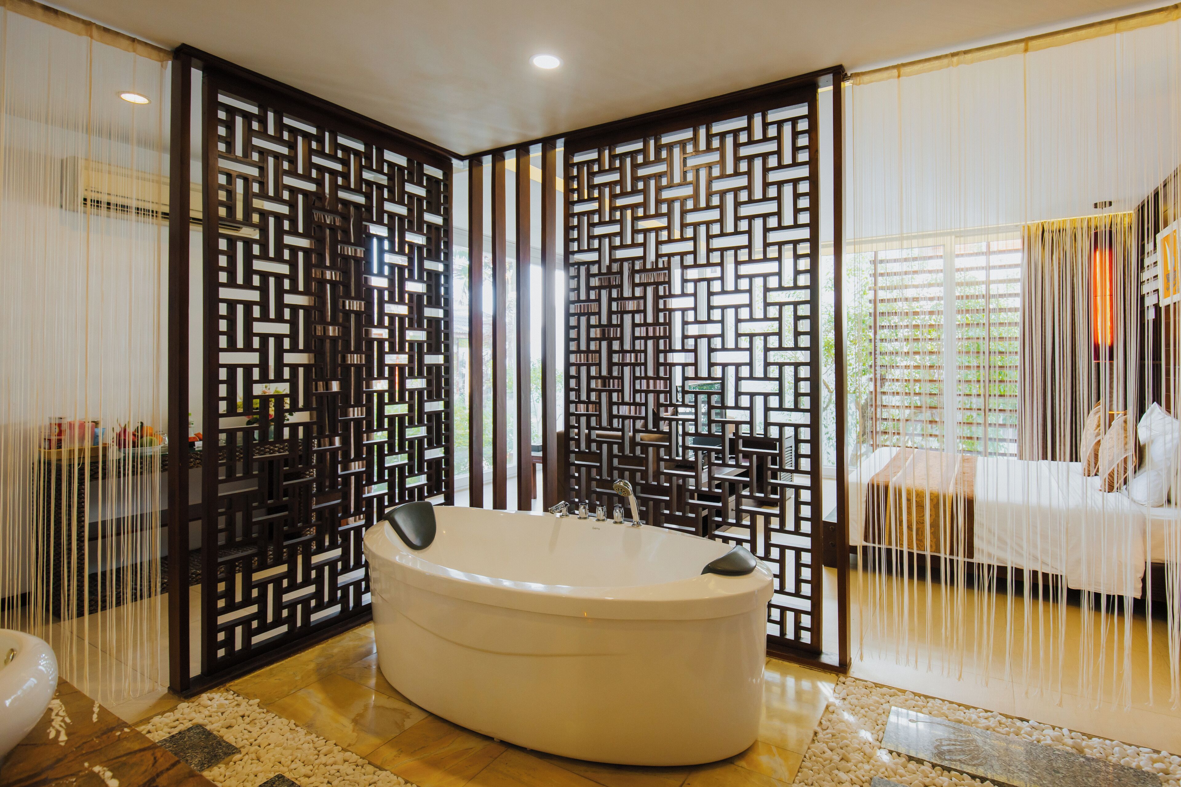 designer toiletries, hair dryer, bathrobes, slippers