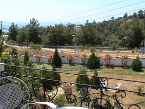 Enjoy a serene view of the beautifully landscaped garden from your balcony.