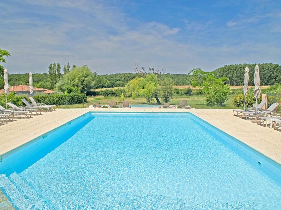 Seasonal outdoor pool, open 10:00 AM to 8:00 PM, pool umbrellas