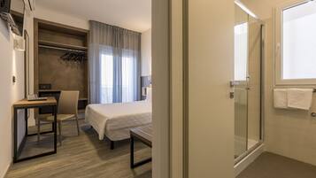 Family Quadruple Room, Sea View | Minibar, in-room safe, desk, free WiFi