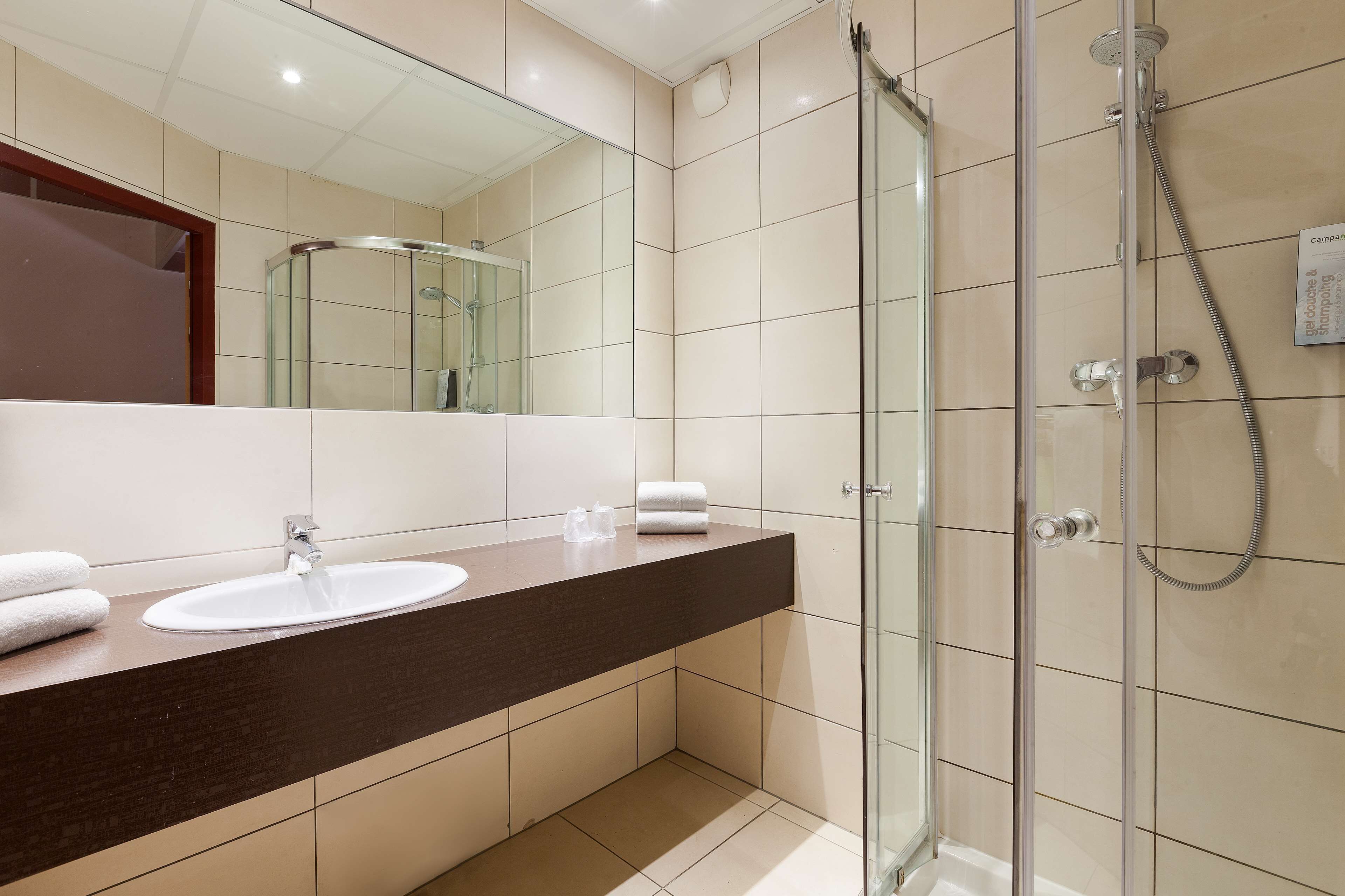 standard room, 1 queen bed | bathroom | eco-friendly toiletries, hair dryer, towels, soap