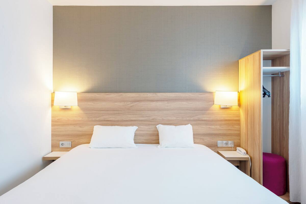 comfort room, 1 double bed | desk, blackout curtains, soundproofing, iron/ironing board