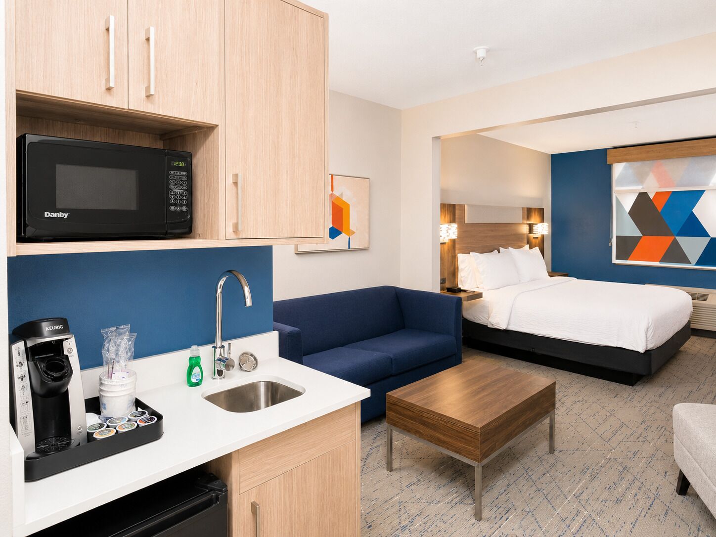 Premium bedding, down comforters, pillowtop beds, in-room safe