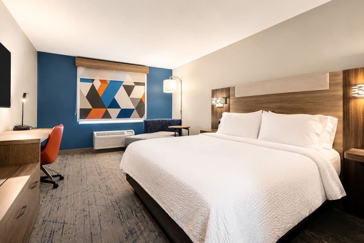Premium bedding, down comforters, pillowtop beds, in-room safe