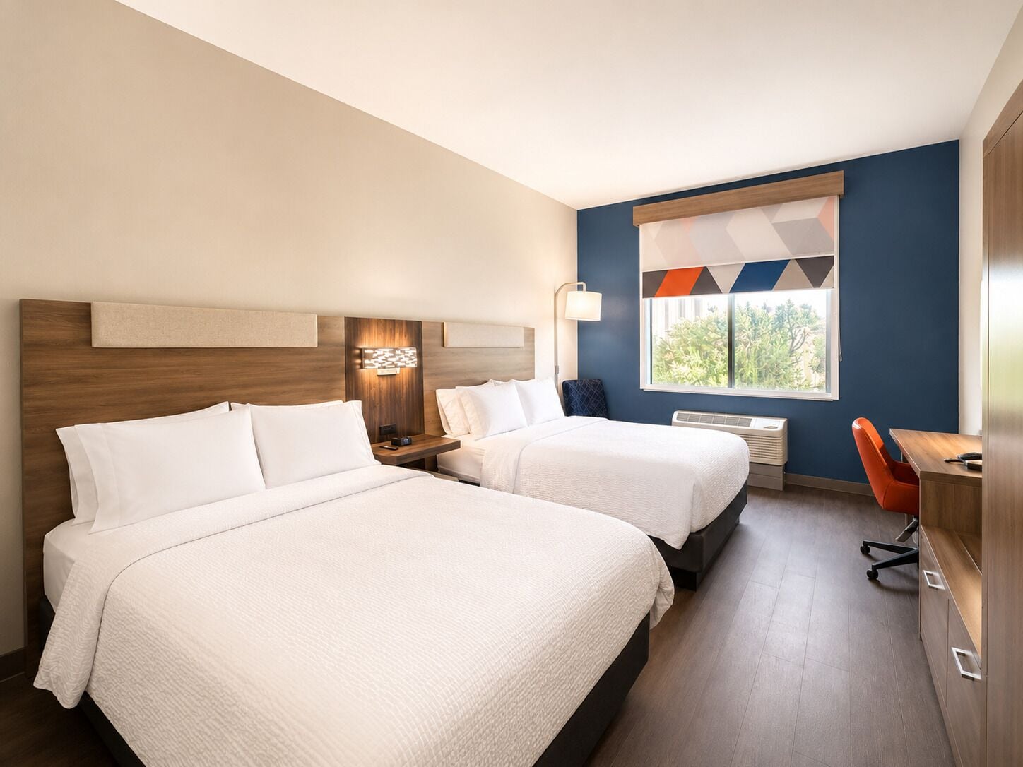 Premium bedding, down comforters, pillowtop beds, in-room safe
