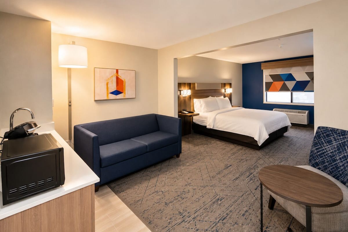 Suite, 1 King Bed, Accessible (Mobility, Accessible Tub) | Premium bedding, down comforters, pillowtop beds, in-room safe