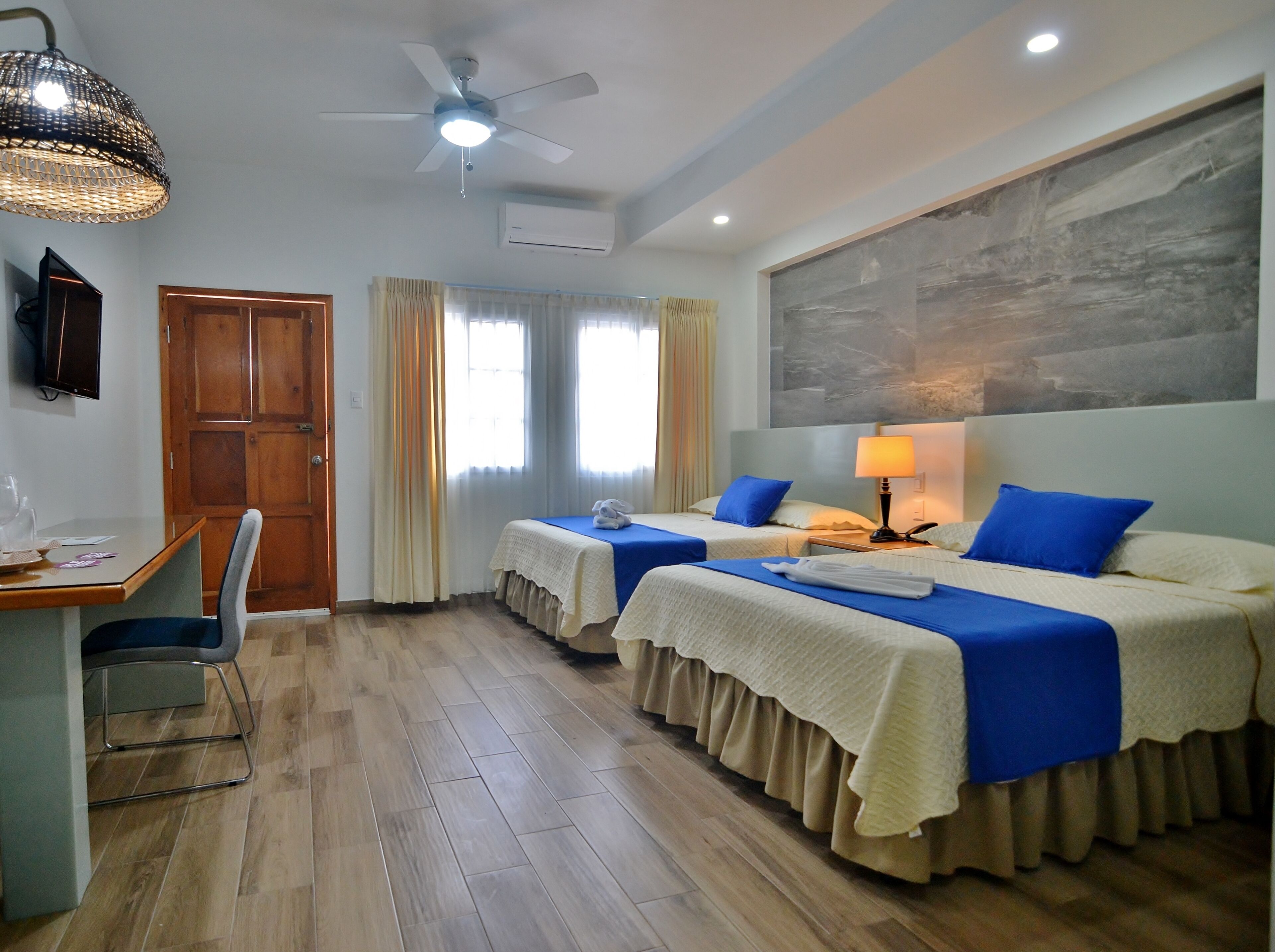 basic twin room | in-room safe, desk, blackout curtains, free wifi