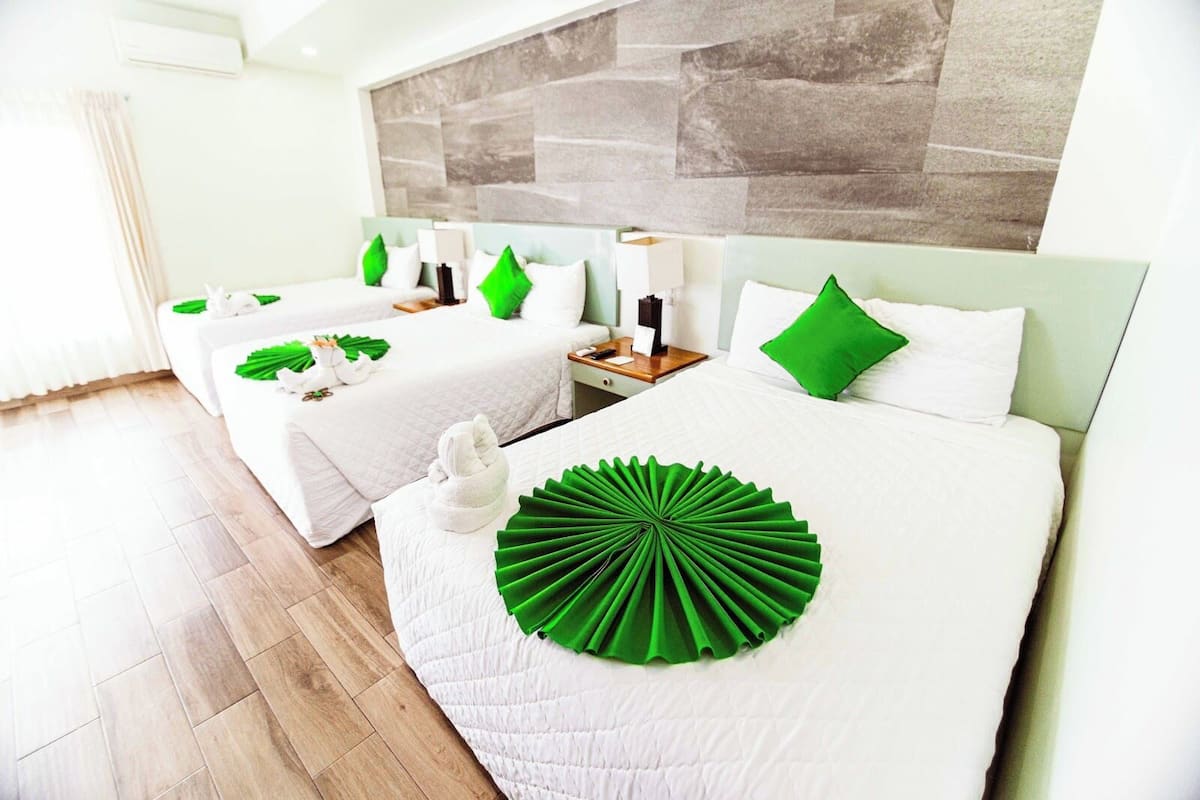 standard triple room, multiple beds | in-room safe, desk, blackout curtains, free wifi