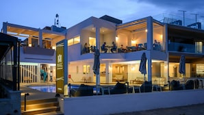 A modern hotel with a pool, outdoor seating, and a restaurant on the ground floor. - Mare Boutique - Adults Only (Apokoronas)