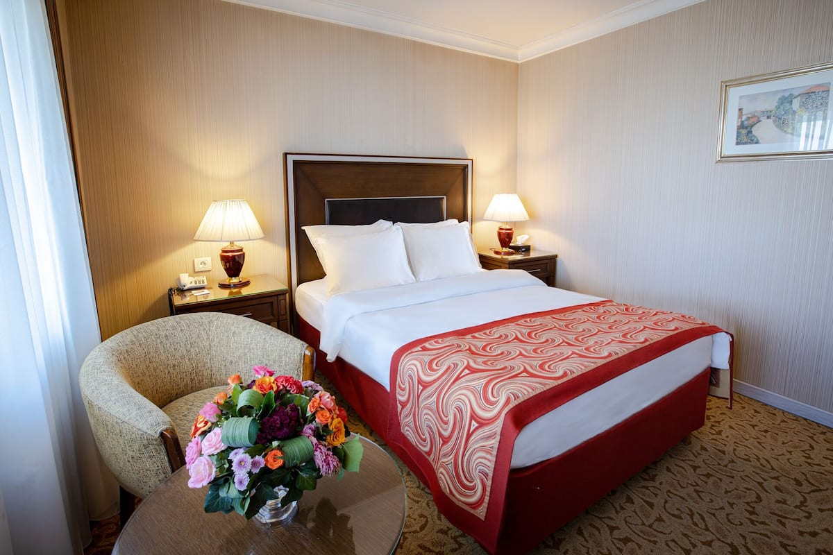 Superior Double Room | Minibar, in-room safe, desk, laptop workspace