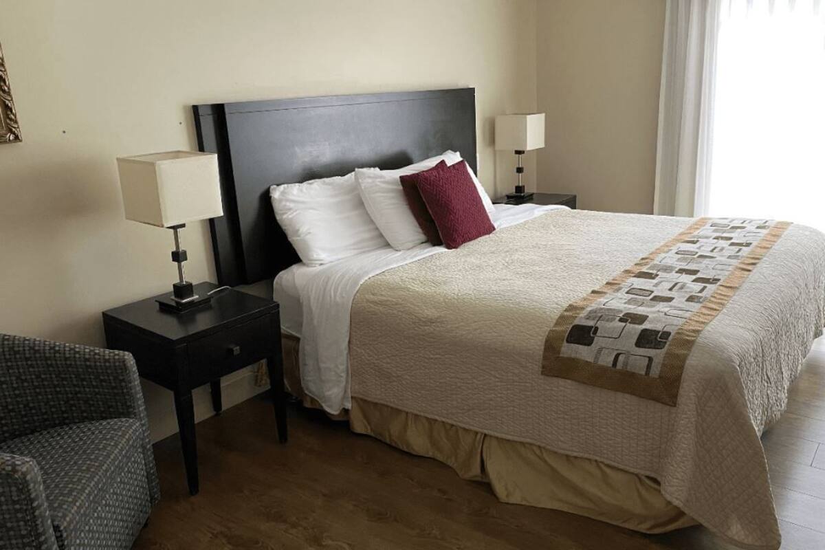 Classic Room, 1 King Bed, Single Whirlpool Tub, Balcony | Premium bedding, blackout curtains, soundproofing, free WiFi